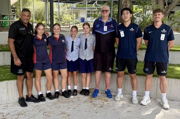 Educational mentors and students at school